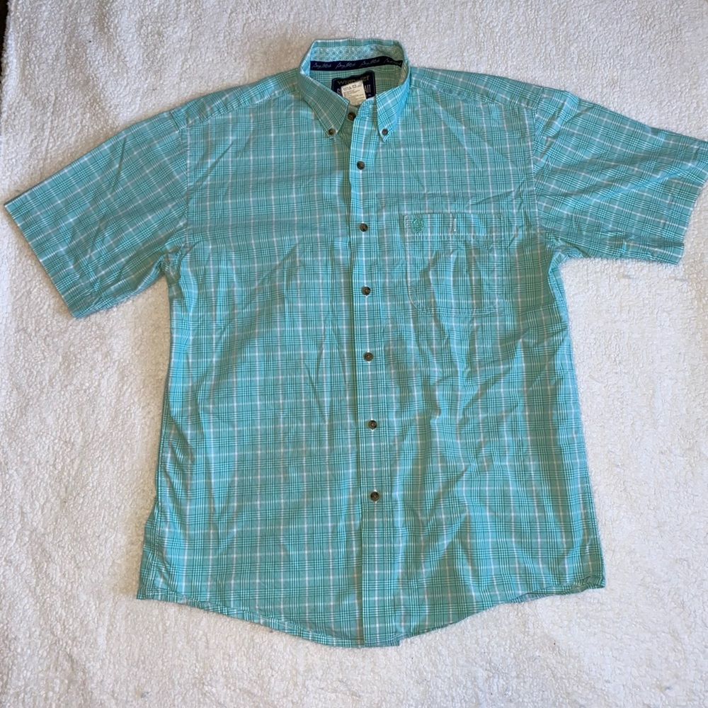 Teal wrangler pearl snap 
Tag size M 
GEORGE STRAIT COLLECTION